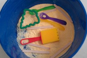 Cornmeal Sensory Bin